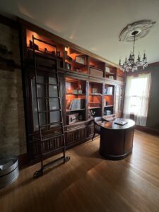 library-office-built-in-bookshelves-rolling-ladder