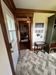 mudroom-brick-tile-new-drywall-built-in-lockers-olive-green