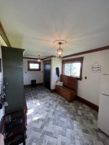 mudroom-brick-tile-new-drywall-built-in-lockers-olive-green